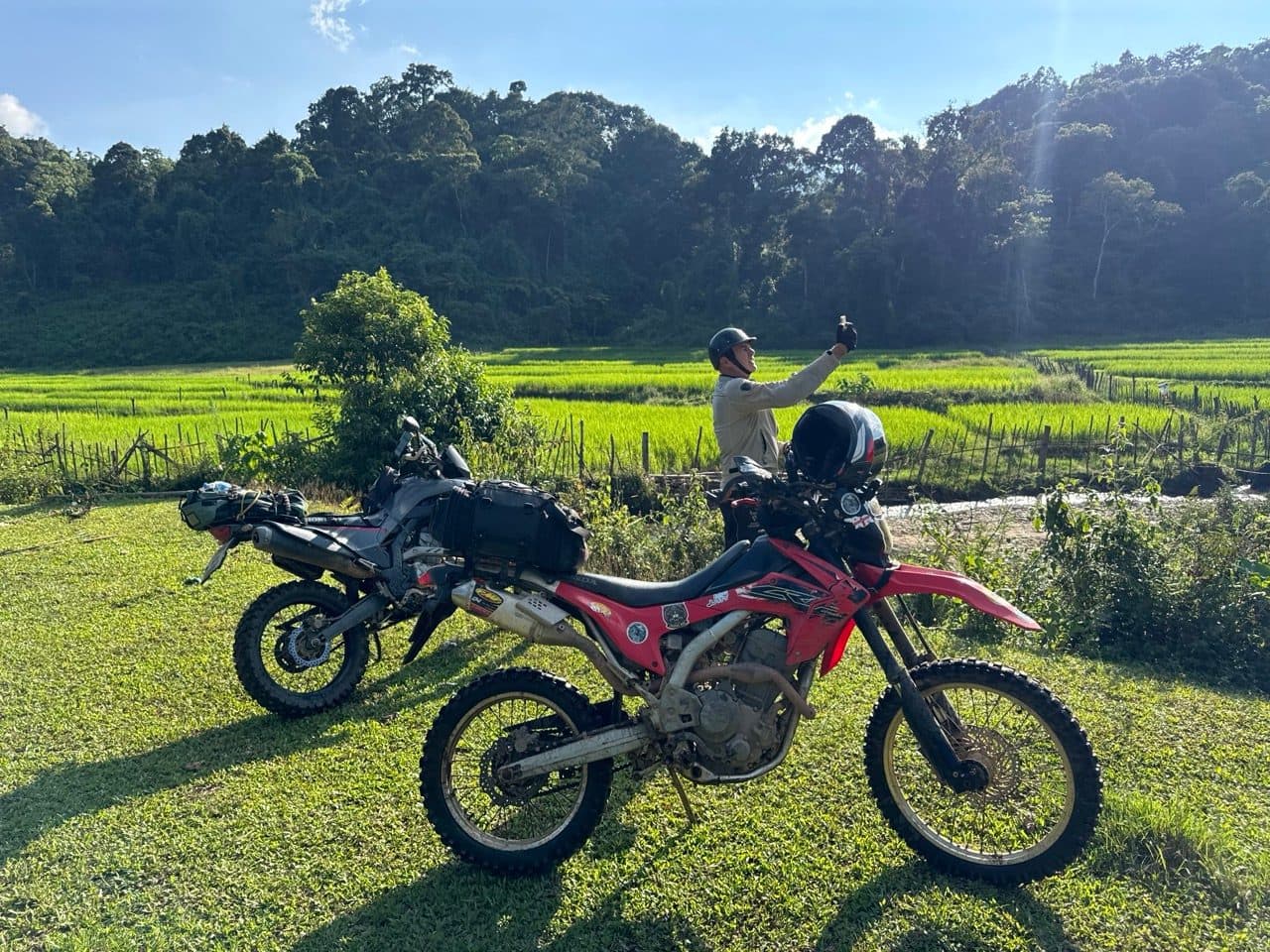Both bikes at the paddy edge.