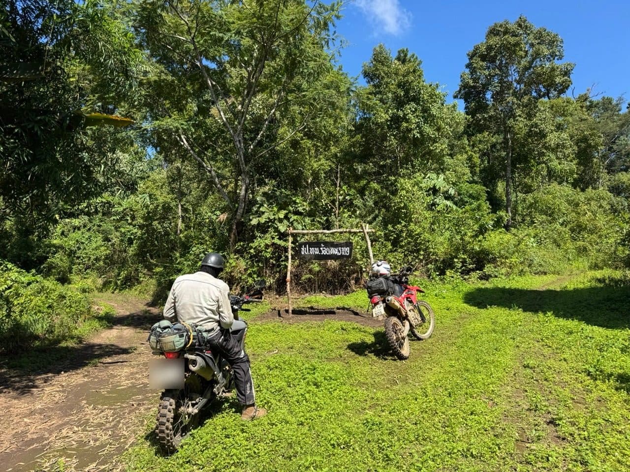 Both bikes at the outpost, nobody about.
