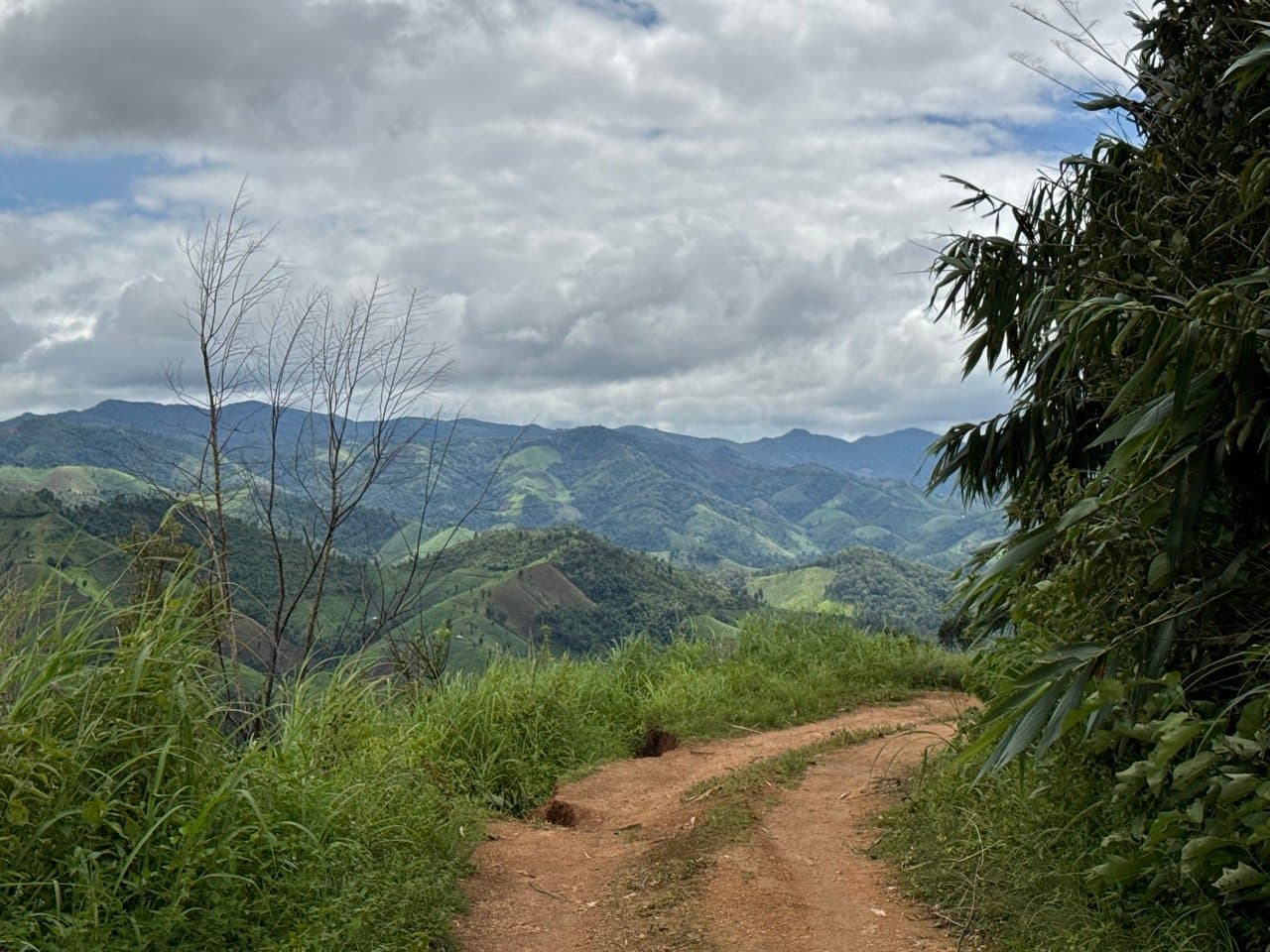 Two-track running out along a ridge, valleys either side.